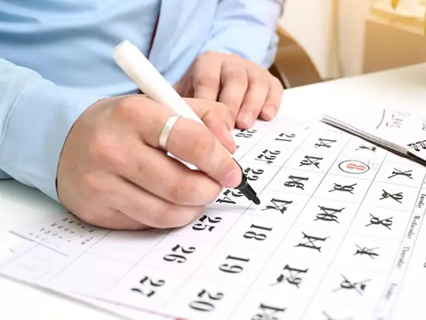 Calendário marcado com a data para parar de fumar